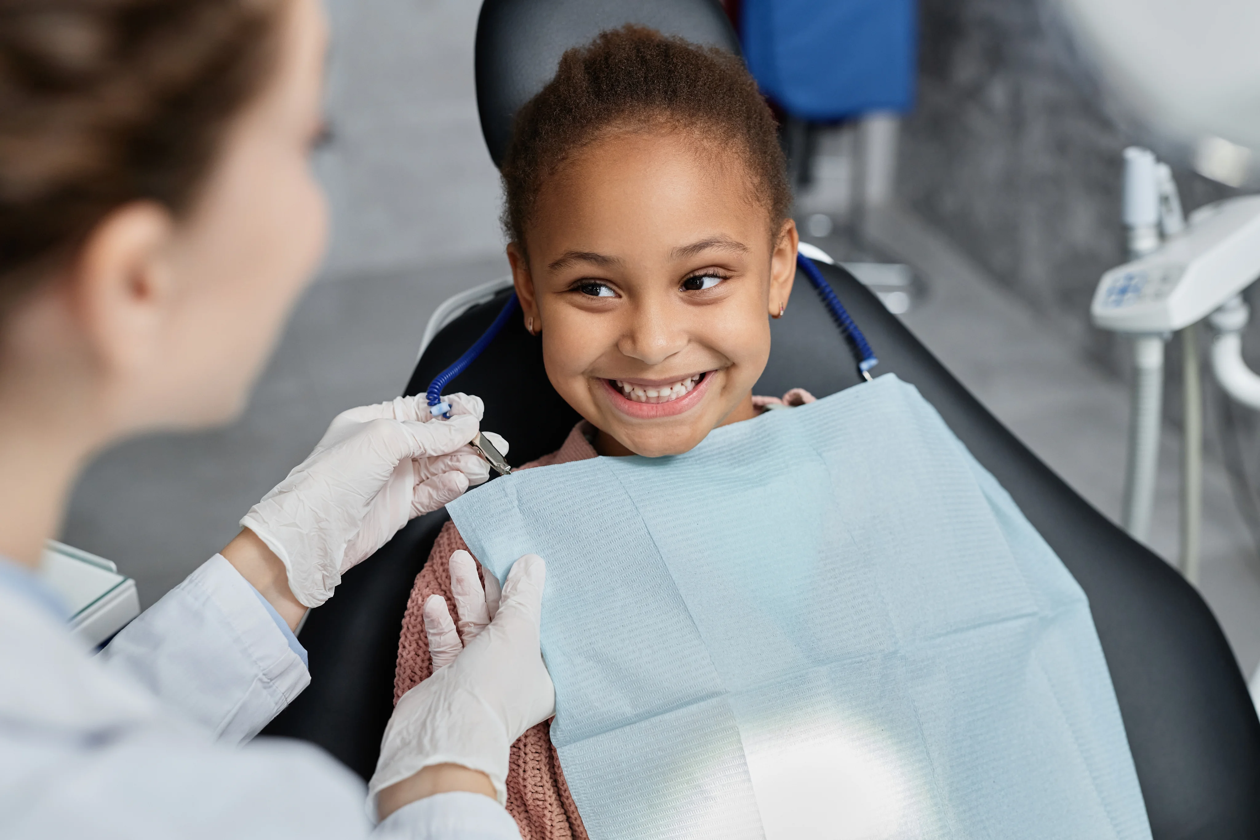 Doctor with a young patient at Texas Kids Dental